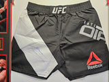 Nate Diaz "UFC" Autographed Black & White Custom Trunks frame outside size framed 32x40 Mat Finish Black Frame. JSA